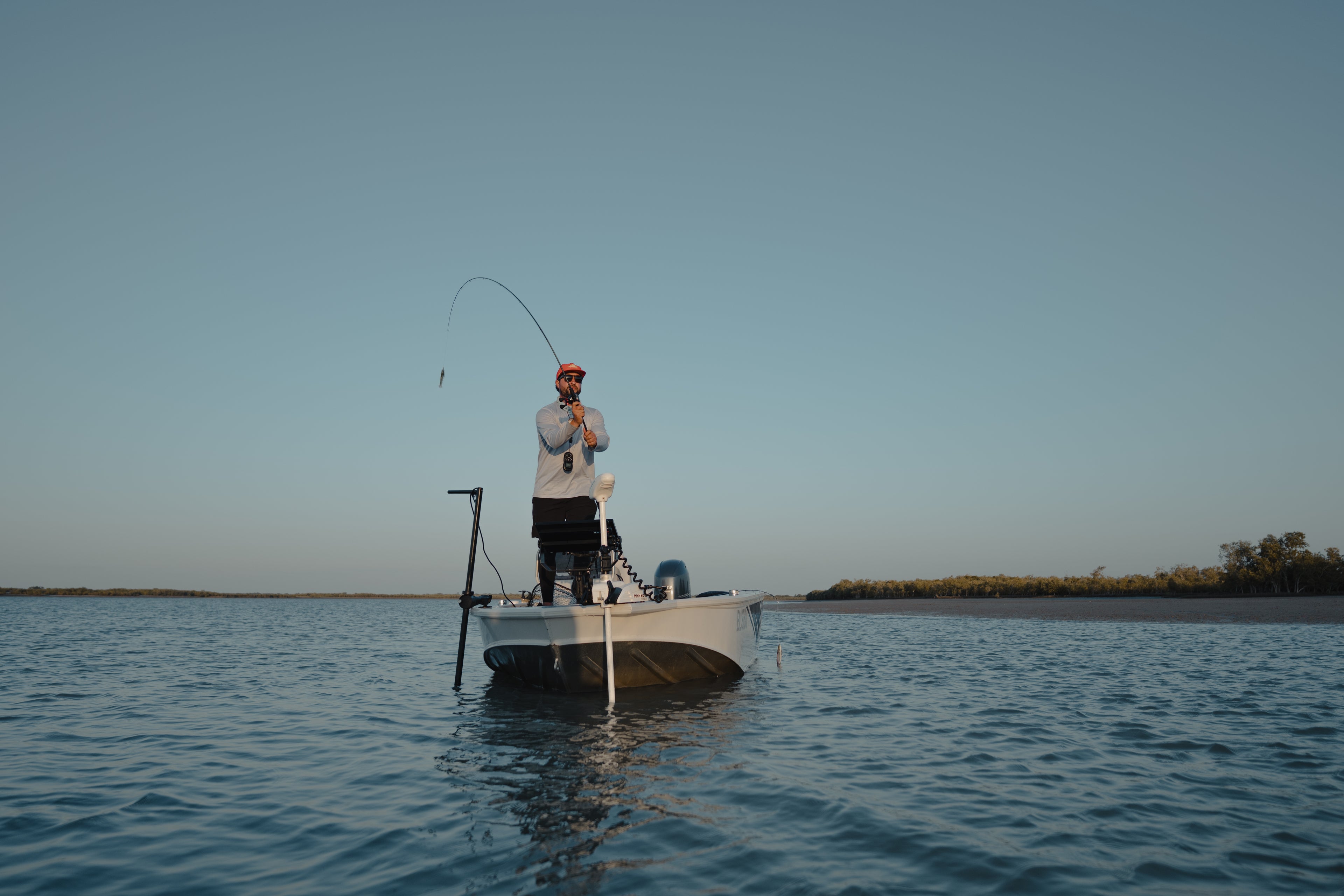 Pelagic Pursuit fishing in Queensland using the Dark Tide Marine Mirror screen on his tinny